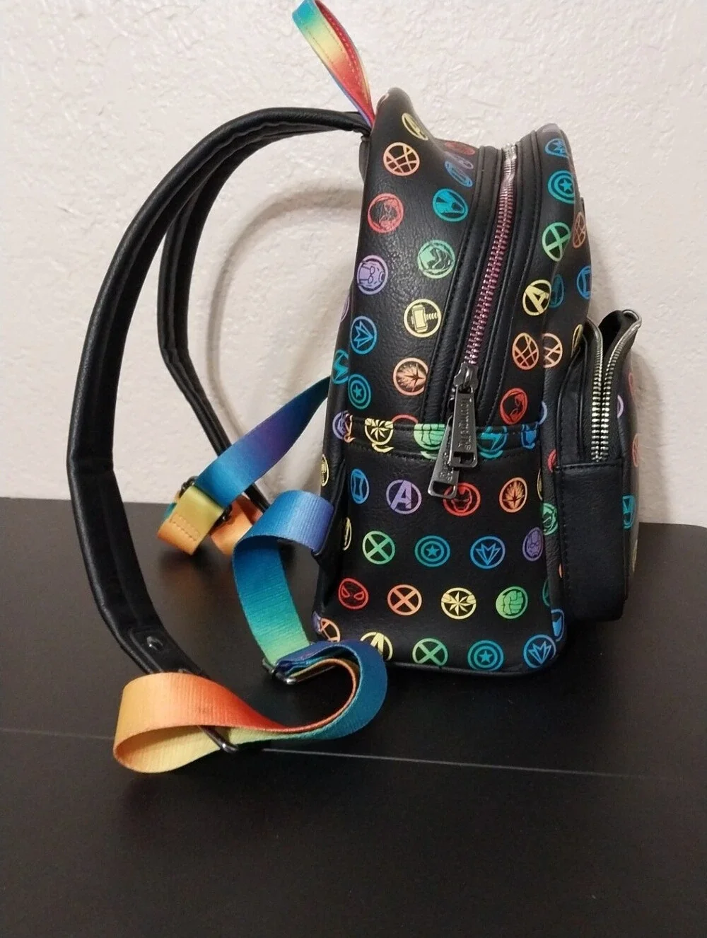 Loungefly Black Mini Backpack with Colorful Marvel Superhero Icons